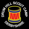 Drum Hill Scout Camp written above a red drum on a black background. Below the drum it says Derbyshire.